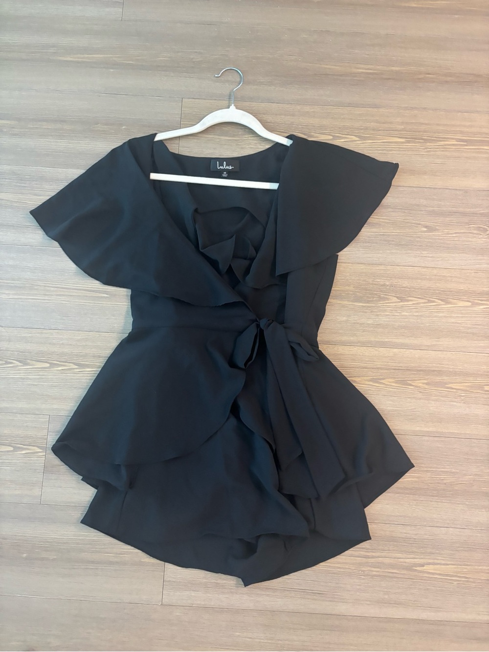 Lulu's Black Wrap Romper with Ruffle Detail